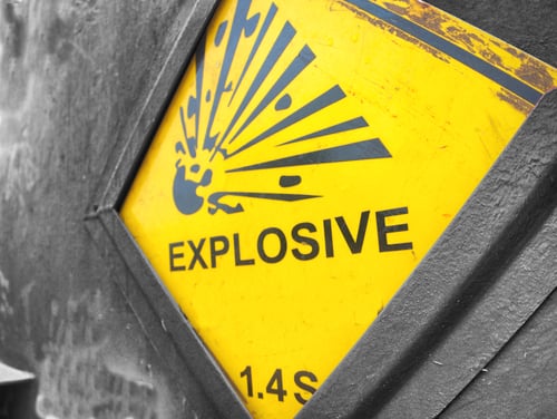 Explosive warning sign on the steel reinforce magazine carrier
