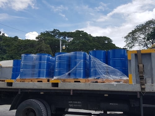 oil drums loaded on truck