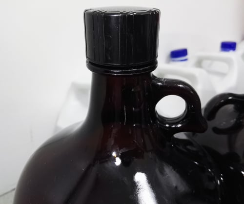 large amber bottle containing chemicals