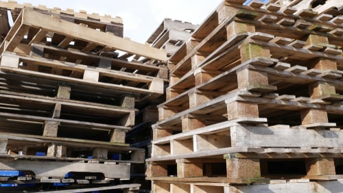 wood pallets in outdoor storage yard