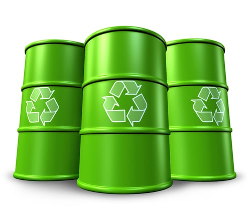 green recycling barrels and drums