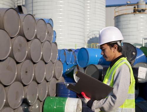 Manufacture worker check the number of drums