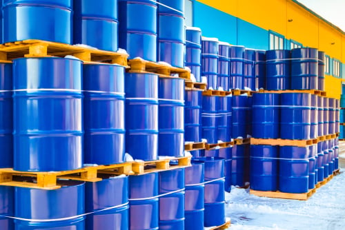 blue barrels for storage lined up