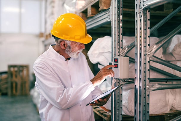 checking temperature in warehouse