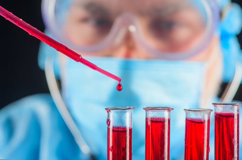 doctor working on blood samples