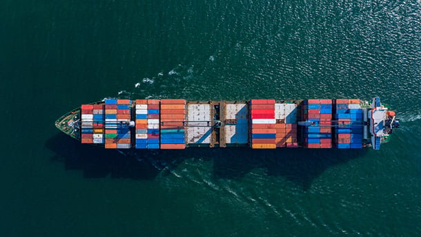 Aerial view container ship carrying container