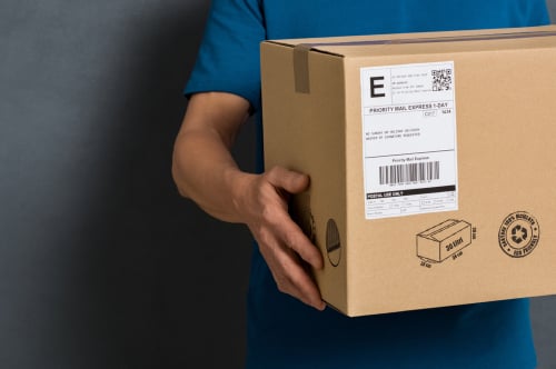 delivery person holding box