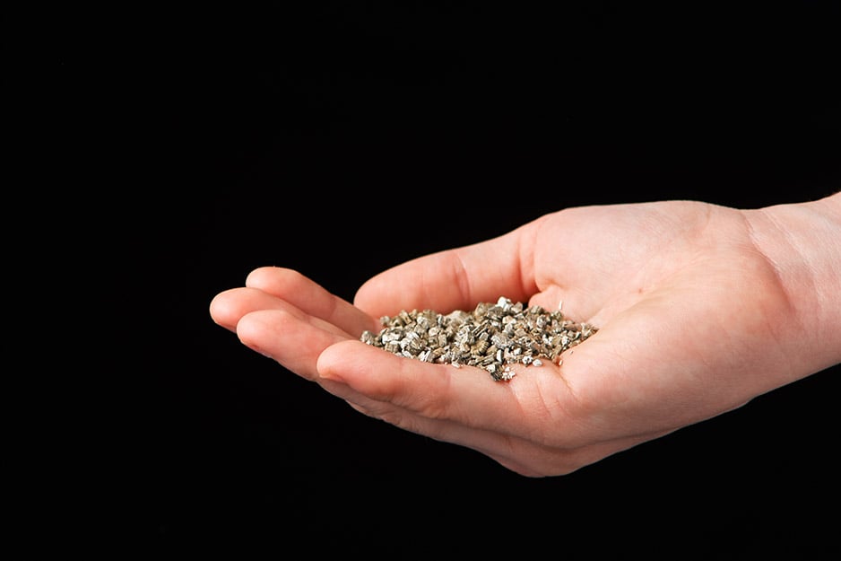 hand holding vermiculite