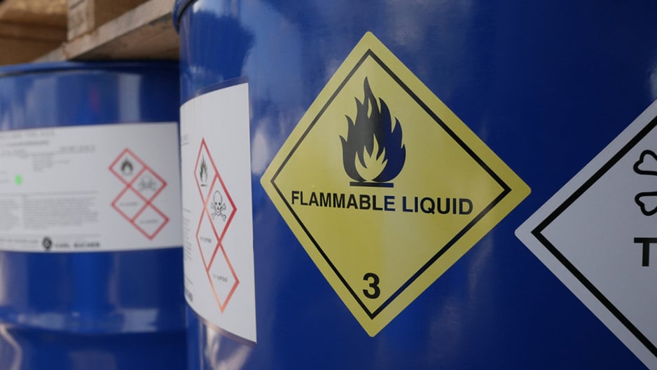 toxic flammable label on barrels